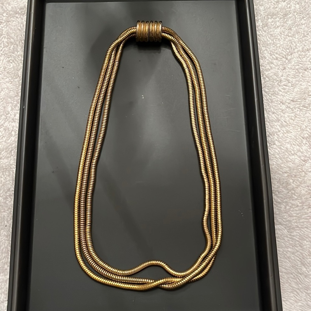 Gold tone 3 strand necklace